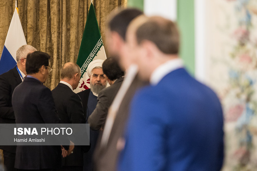 چهره خاص روحانی در گفتگو با پوتین چهره خاص روحانی در گفتگو با پوتین