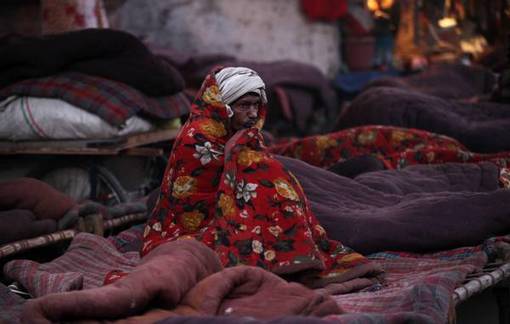 مردم فقیر هند در سرمای پایتخت - ANSA
