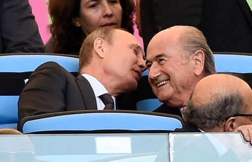 ولادیمیر پوتین و سپ بلاتر در حاشیه دیدار فینال جام جهانی در ورزشگاه ریو دوژانیرو /Reuters 