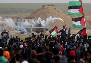 استشهاد فتى فلسطيني واصابة العشرات برصاص الاحتلال الصهيوني في قطاع غزة
