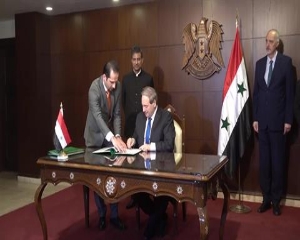 المقداد يوّقع الاتفاق الإطاري للانضمام إلى التحالف الدولي للطاقة الشمسية بحضور السفير الهندي