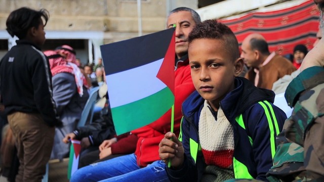 مهرجان جماهيري في مخيم اليرموك بدمشق إحياء ليوم الأرض الفلسطيني