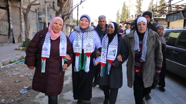 مهرجان جماهيري في مخيم اليرموك بدمشق إحياء ليوم الأرض الفلسطيني