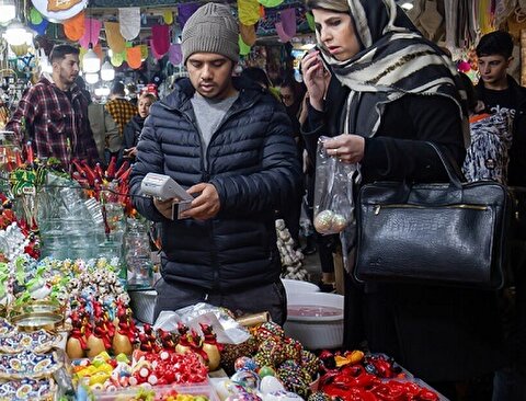 بالصورة: اجواء مدينة طهران عشية عيد النيروز