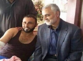 عیادت سردار سلیمانی از مجروحان عراقی در تهران+تصویر