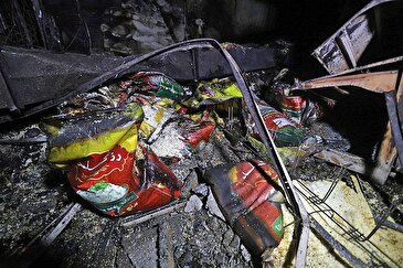 عکس: آتش زدن فروشگاه مواد غذایی توسط اغتشاشگران