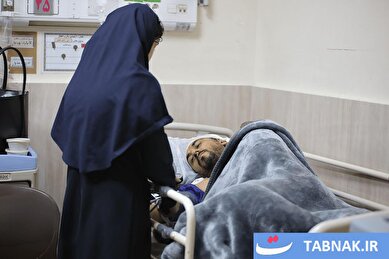 عکس: تلاش کادر درمان برای درمان مجروحان حمله پل B1