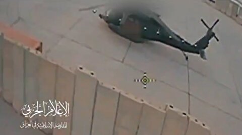 لحظه انهدام هلی کوپتر بلک هاوک توسط مقاومت عراق