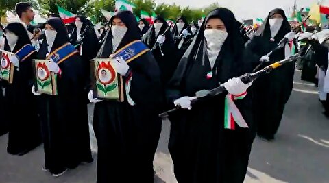 رژه دختران کفن پوش با کلاشنیکف در قم