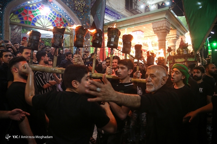 گزارش تصویری از آئین سنتی «مشعل گردانی» عراقی های مقیم تهران 