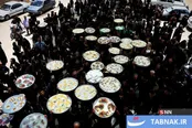 آیین سنتی توزیع غذای نذری در روستای اراضی