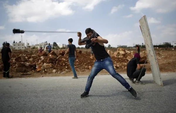 اعترضات جوانان فلسطینی به گسترش شهرک سازی صهیونیست&zwnj;ها در نزدیکی رام الله/Reuters
