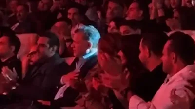 استقبال سنگین از علی دایی در کنسرت روزبه نعمت الهی