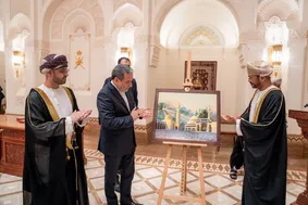 رونمایی تمبر یادبود همکاری ایران و عمان در کاخ العلم + عکس