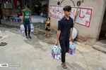 تهیه و توزیع غذا میان سیل زدگان