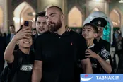 عکس: قهرمانان کشتی، خدمتگزاران صمیمی زائران رضوی