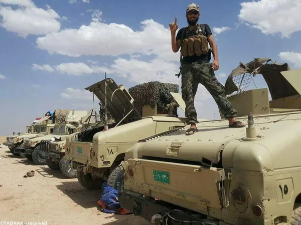 تروریست داعش و تسلیحات مصادره شده ارتش عراق