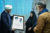 عکس: دیدار مسئولان فرهنگی با خانواده هنرمند شهید پوریا شهبازی